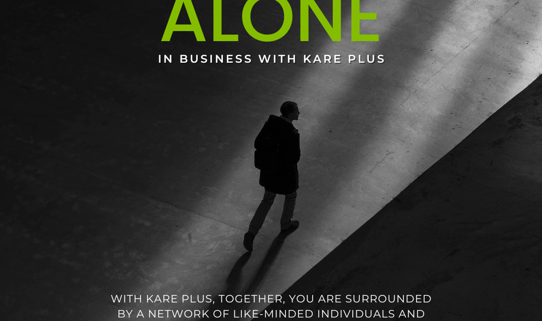 A black and white image of a man walking alone with a text overlay in green and white reminding potential business owners they will not walk alone with a Kare Plus franchise.